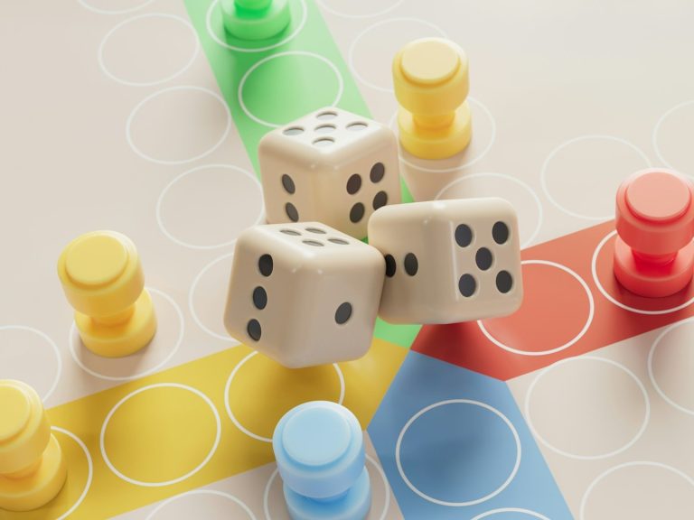 boutique jeux de société et cartes Deux dés blancs et des pions colorés sur un plateau de jeu.